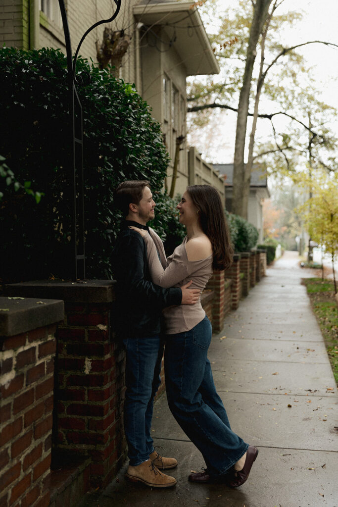 Peyton leaning on Collin during a cozy Virginia Highlands engagement shoot