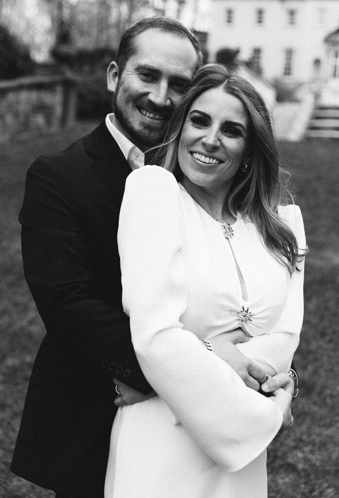 Close-up of Victoria and Ross smiling during their Swan House engagement session