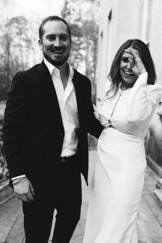 Fun candid photo of Victoria and Ross exploring the Swan House gardens