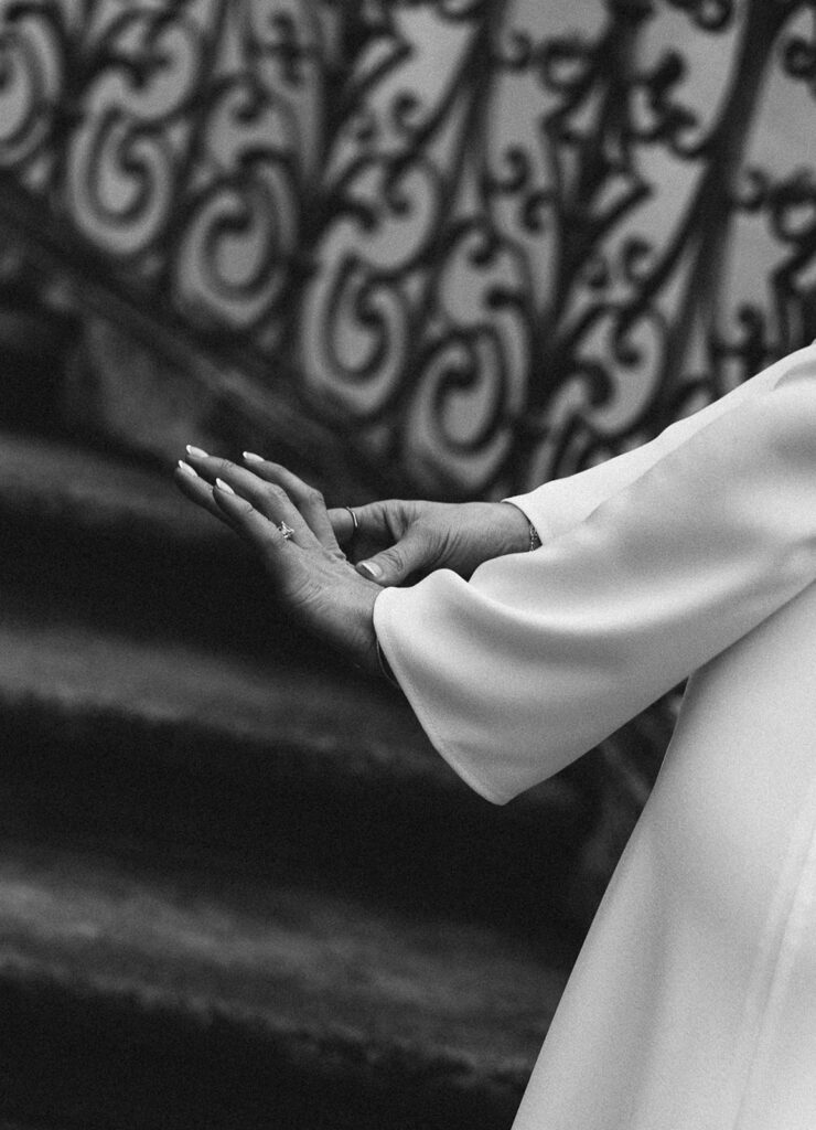 Admiring ring at swan house atlanta engagement session from highland diamonds