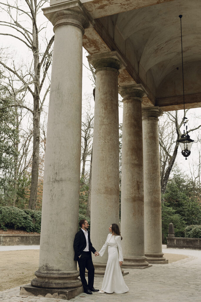 Golden hour engagement photos at the Swan House Atlanta with elegant architecture in the background